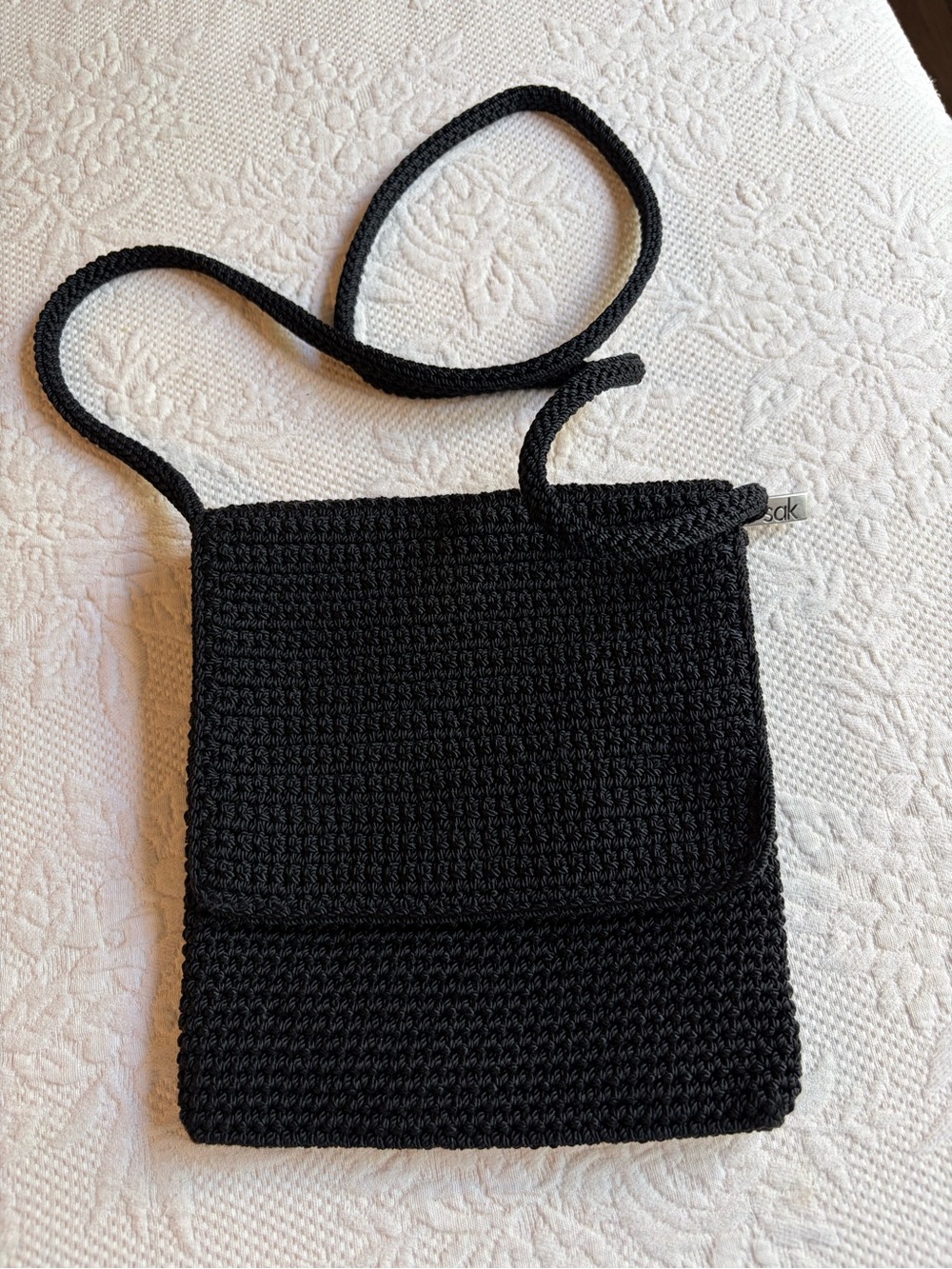 The Sak Black Crochet Crossbody Bag — Classic & Chic
